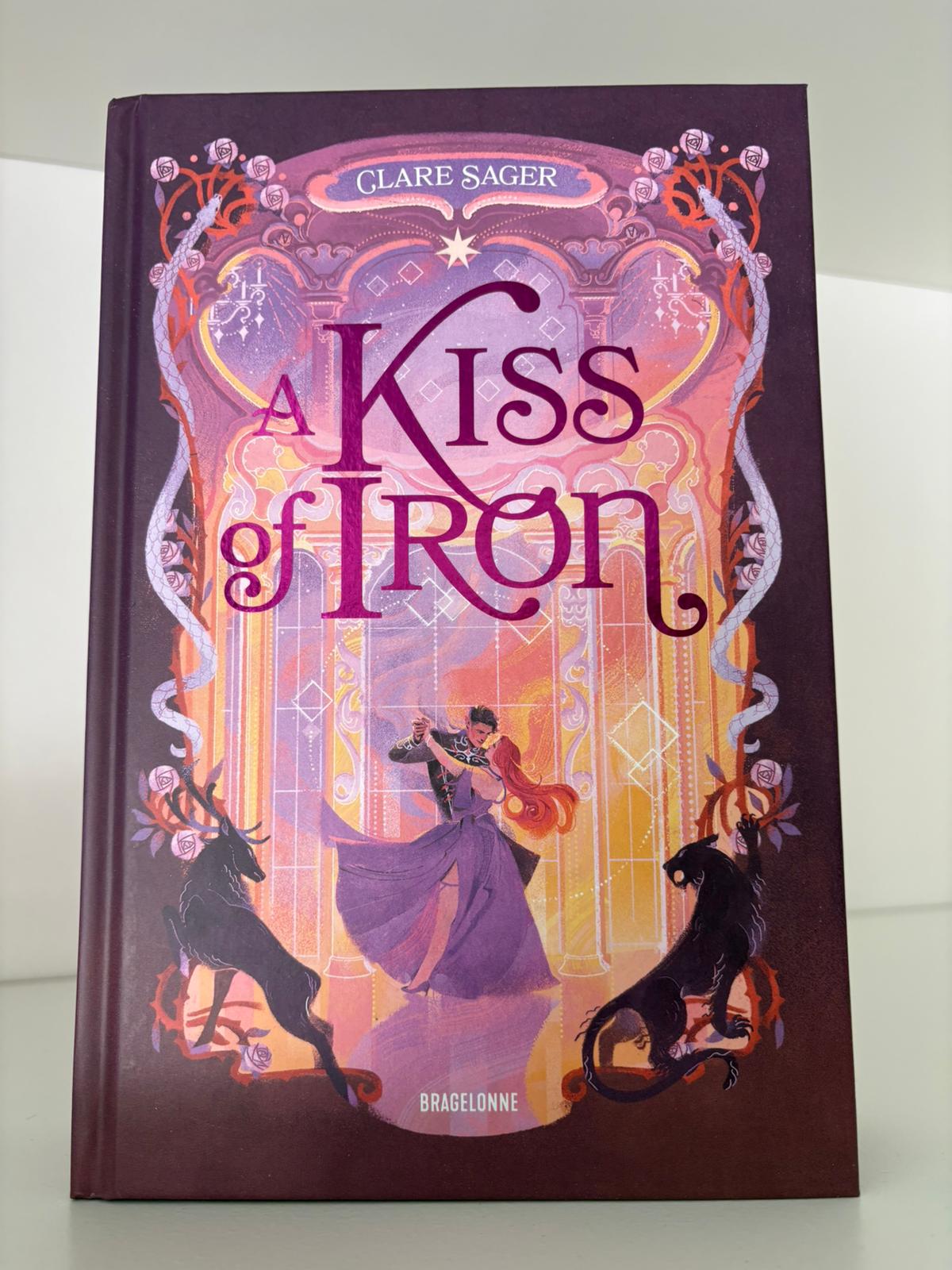 A kiss of iron (1) - Clare Sager (Relié)
